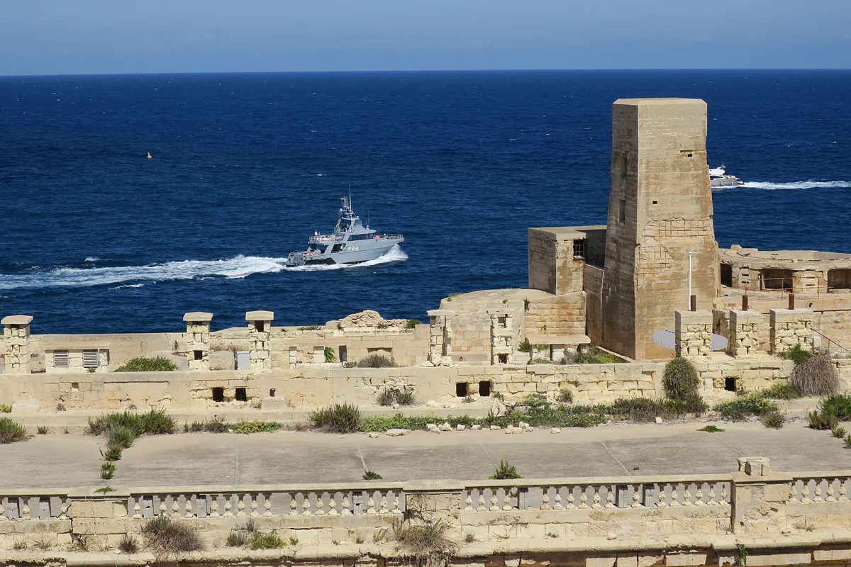 Maltese patrol vessel P24 on duty just outside Fort Saint Elmo, Malta.