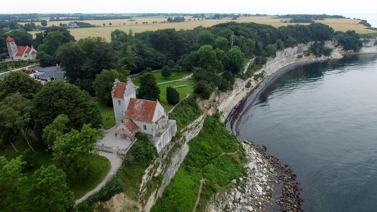 Stenvs Klint, Hojerup, Denmark, UNESCO World Heritage site. Old Højerup Church (Højerup Gamle Kirke) at the top of the cliff dates to 1200. These cliffs are one of the best places in the world to see Cretaceous-Tertiatry